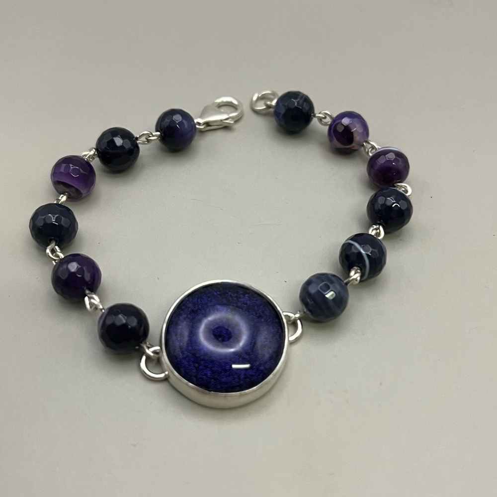 Elegant Purple and Silver Bracelet with Concentric Design